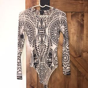 Sheer cream and black long sleeve bodysuit!